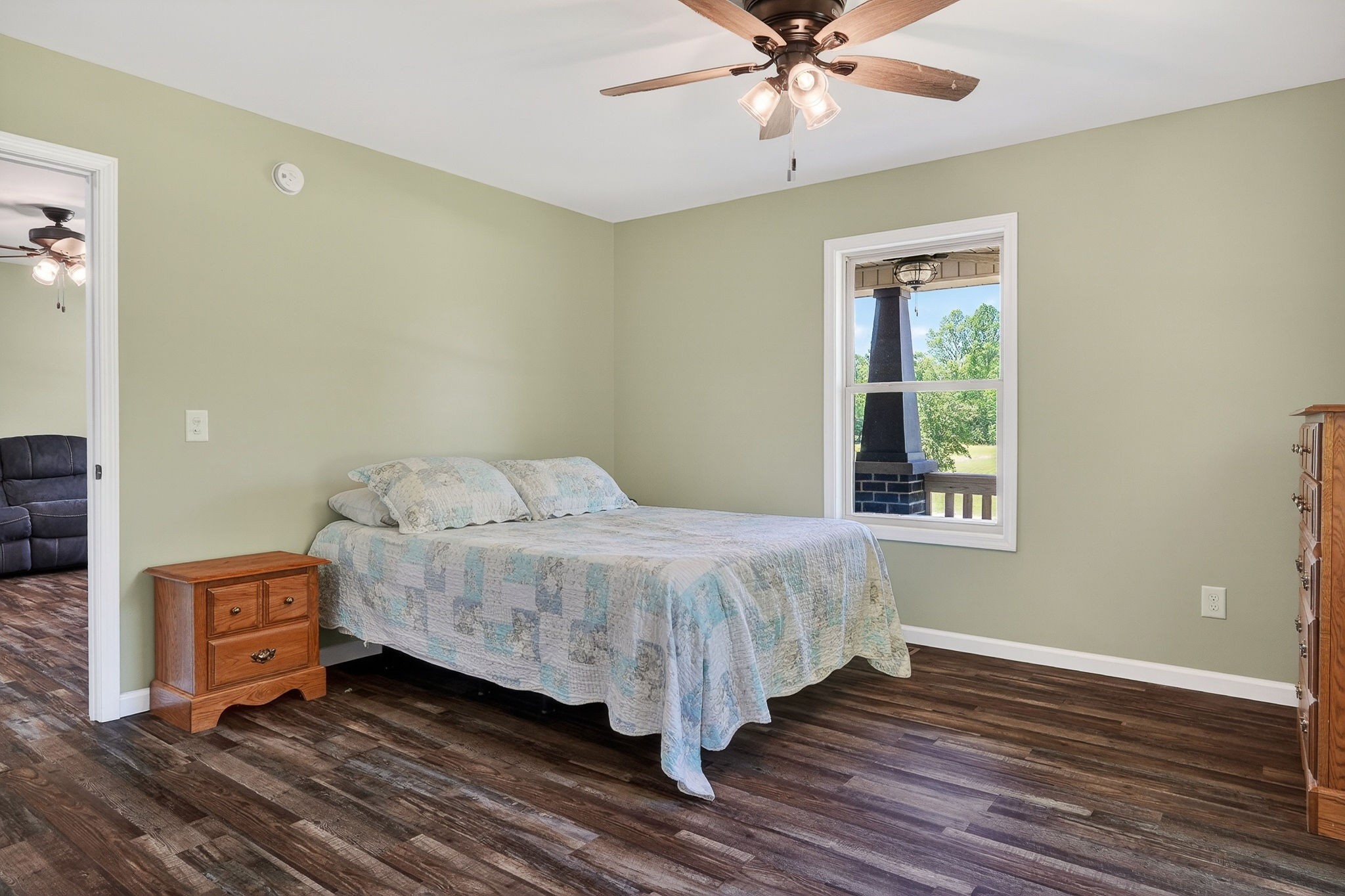 2110 Windle Community Road Cookeville, TN 38506 - Photo 19 of 35 a bed sitting in a bedroom next to a window