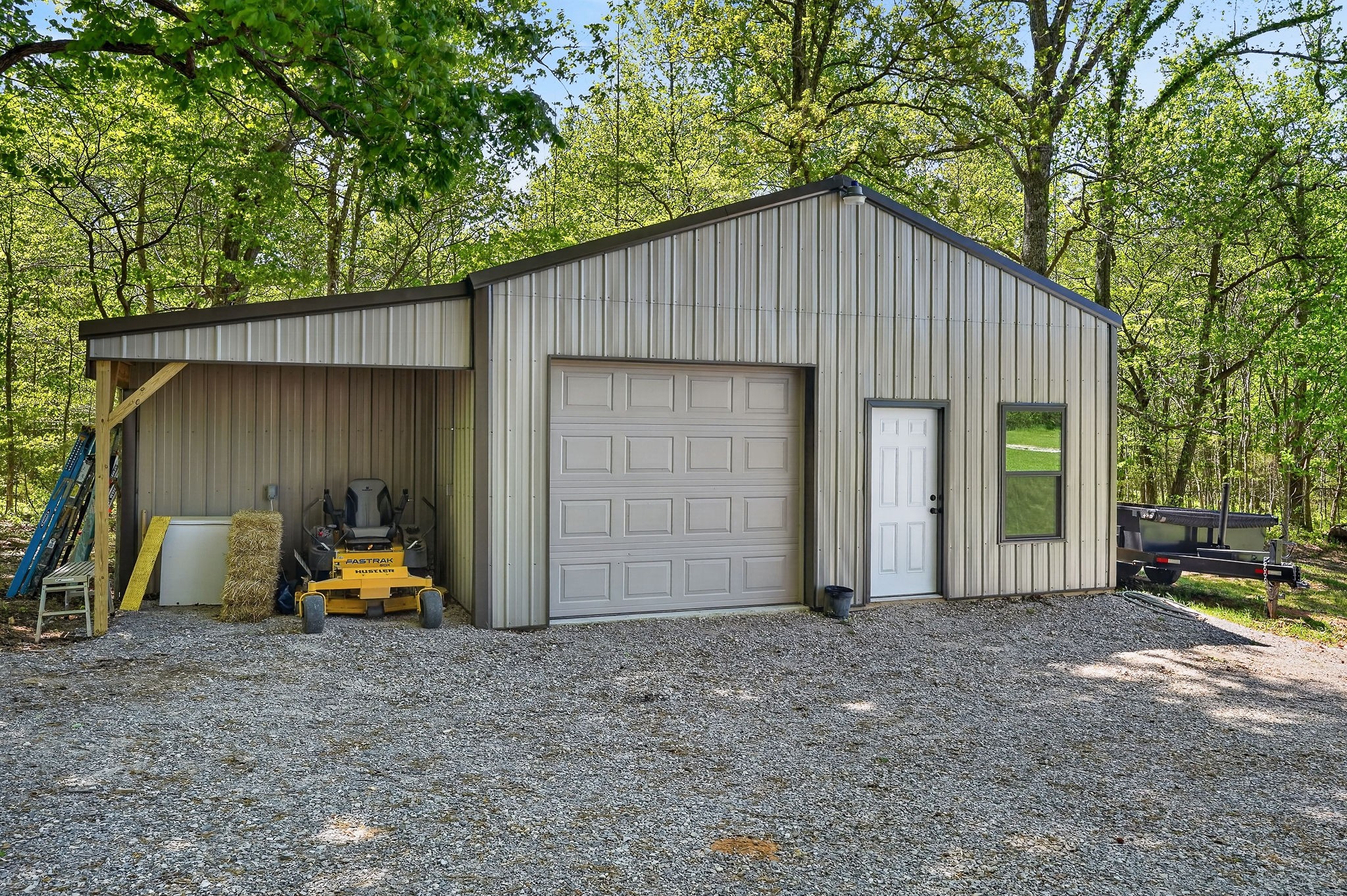 2110 Windle Community Road Cookeville, TN 38506 - Photo 31 of 35 a view of a house with backyard and furniture