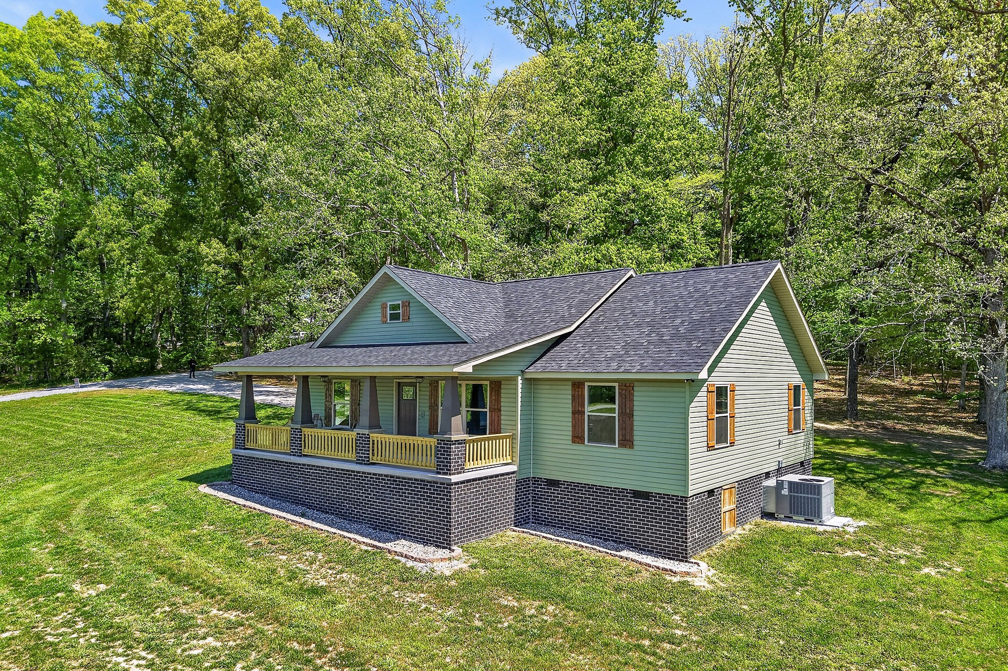 2110 Windle Community Road Cookeville, TN 38506 - Photo 4 of 35 a house view with a garden space