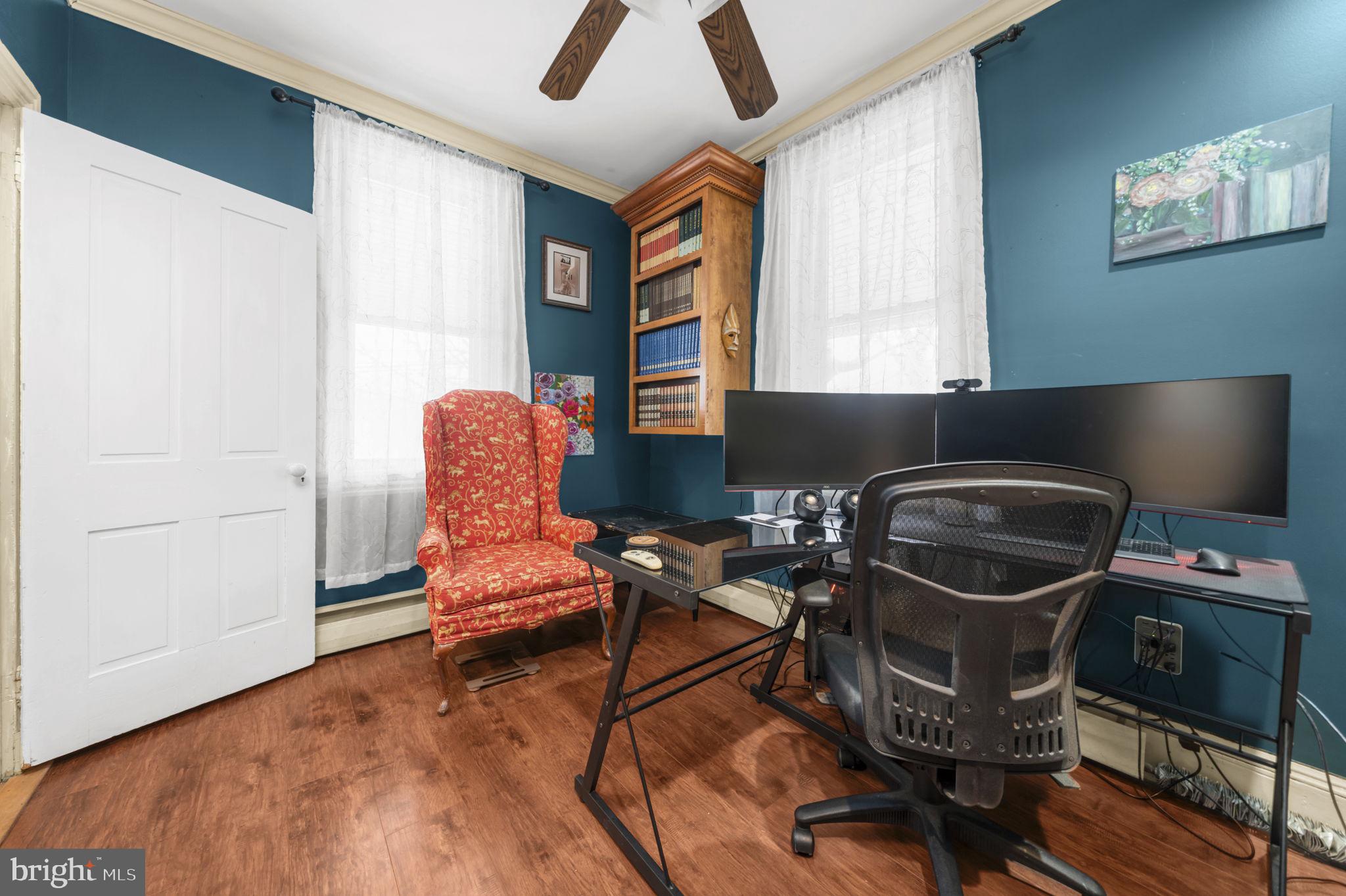103 Gravel Pike Green Lane, PA 18054 - Photo 24 of 43 Cozy workspace with vibrant blue walls.