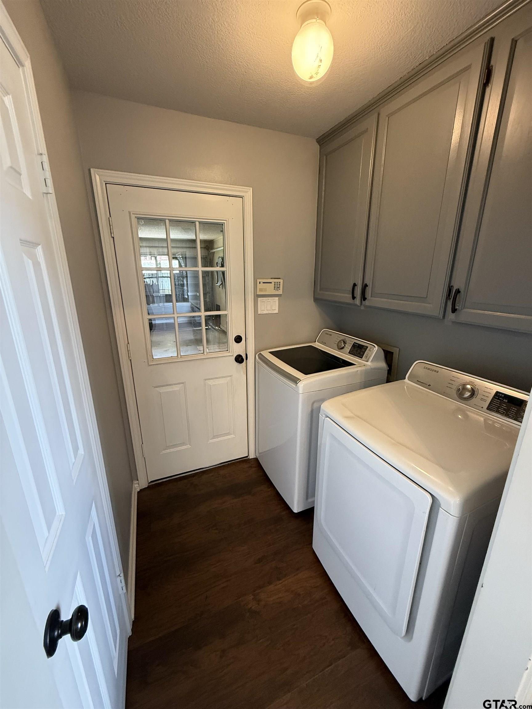 3207 McDonald Road Tyler, TX 75701 - Photo 20 of 24 a utility room with dryer and washer
