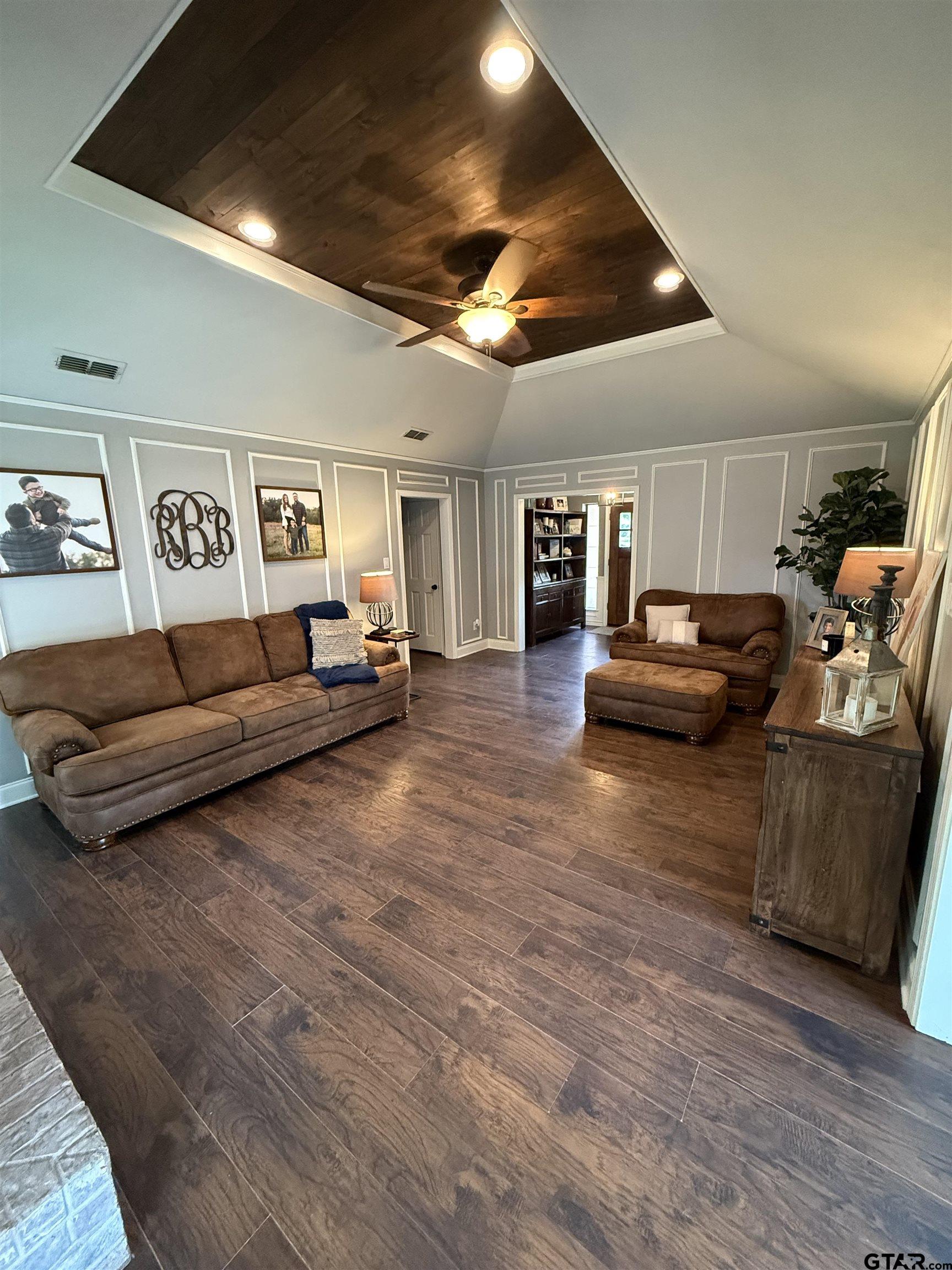 3207 McDonald Road Tyler, TX 75701 - Photo 3 of 24 a living room with furniture and a flat screen tv