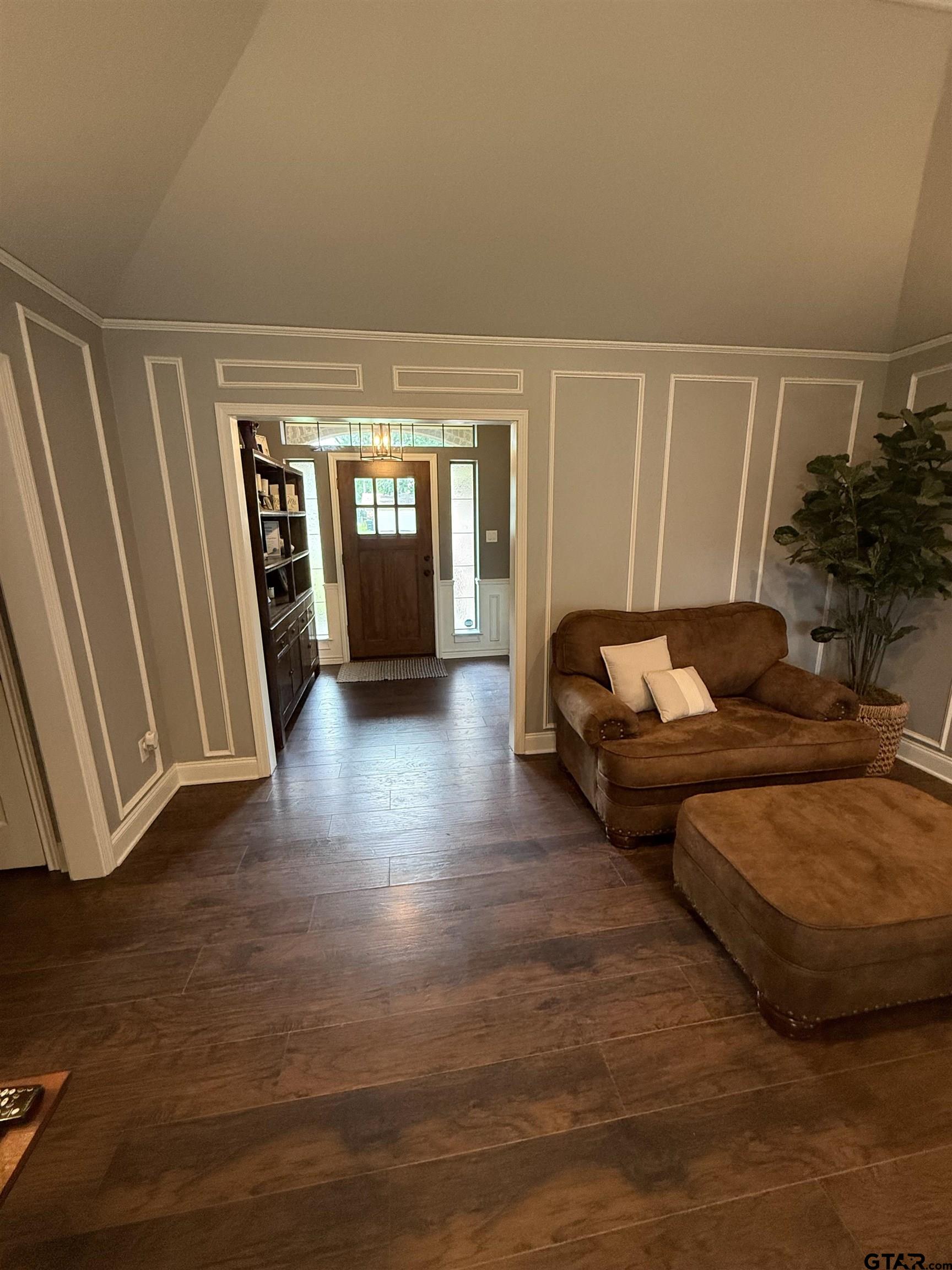 3207 McDonald Road Tyler, TX 75701 - Photo 6 of 24 a living room with furniture and a fireplace