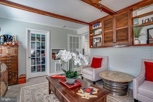 a room with furniture and wooden floor