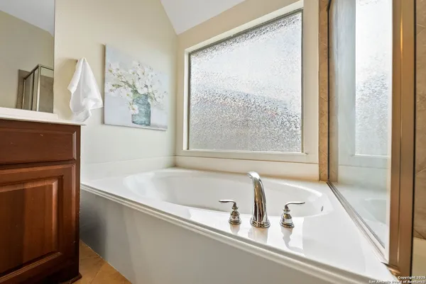 a close view of a bathtub in a bathroom