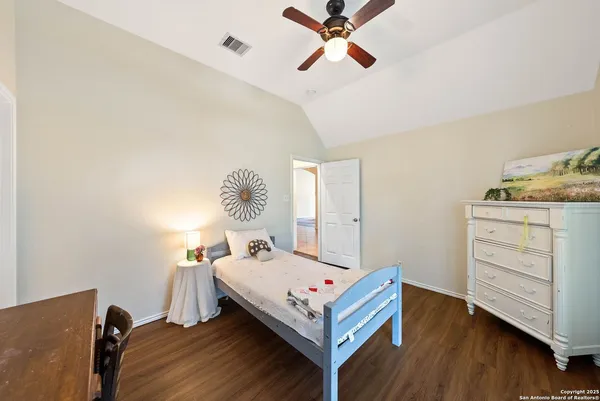 a bed room with a bed and a window