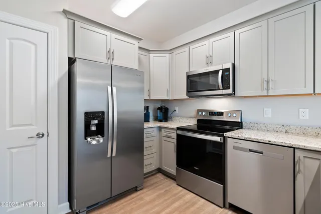 $338,900 | 619 Spencer-Farlow Drive, Unit 23, Carolina Beach, NC 28428