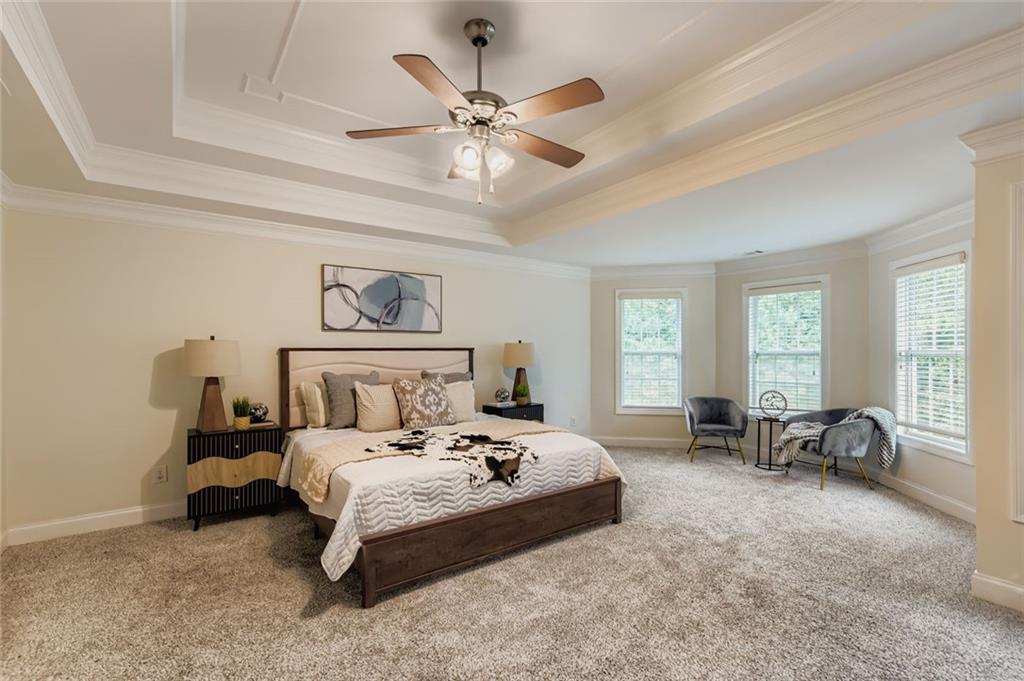 7641 Capps Ridge Lane Douglasville, GA 30135 - Photo 13 of 26 a bedroom with a bed and a large window