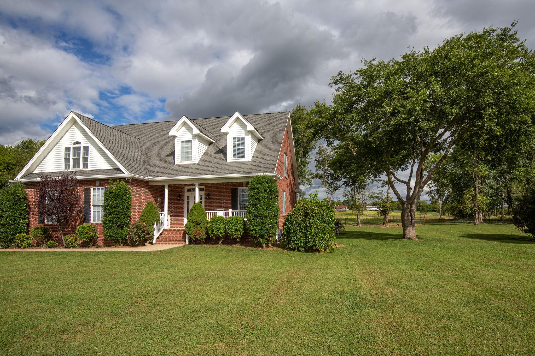 1207 Maple Hill Road Lebanon, TN 37087 - Photo 3 of 29 a front view of house with yard and green space