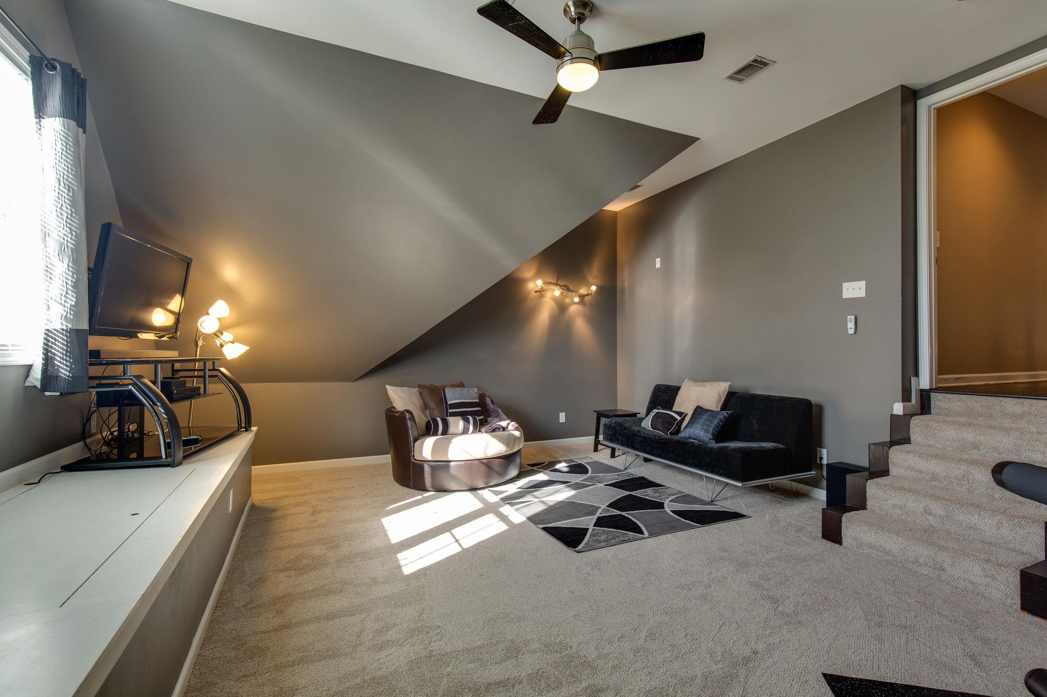 1207 Maple Hill Road Lebanon, TN 37087 - Photo 22 of 29 a room with gym equipment and a large window