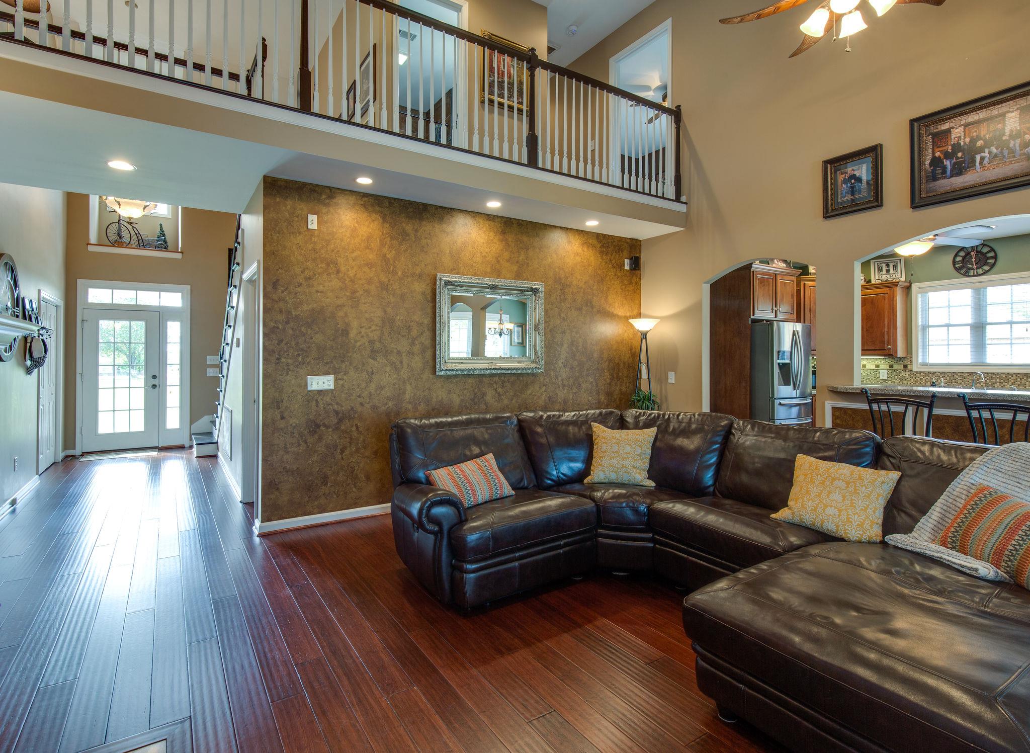 1207 Maple Hill Road Lebanon, TN 37087 - Photo 5 of 29 a living room with furniture and a wooden floor