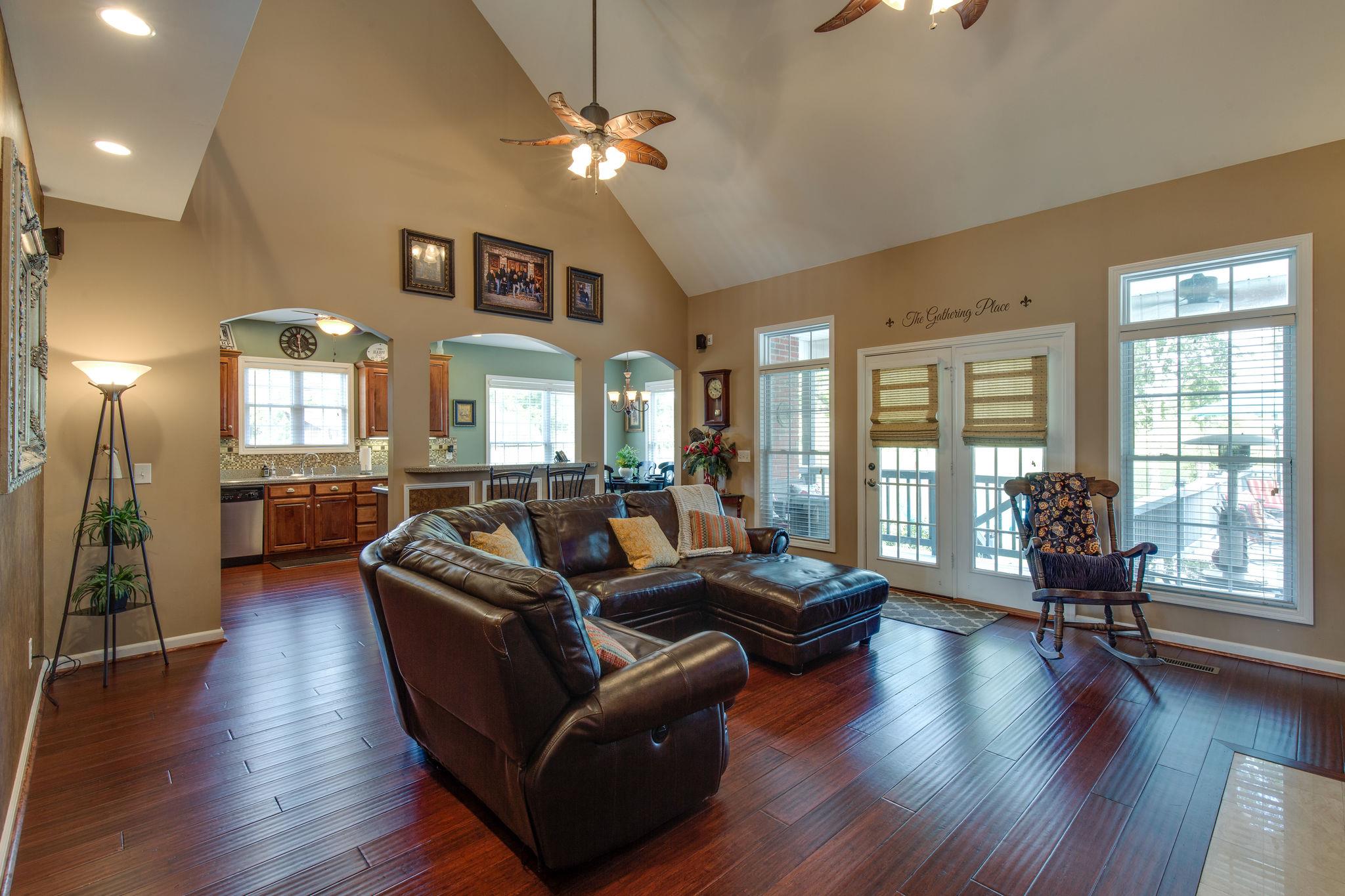 1207 Maple Hill Road Lebanon, TN 37087 - Photo 6 of 29 a living room with fireplace furniture and a wooden floor