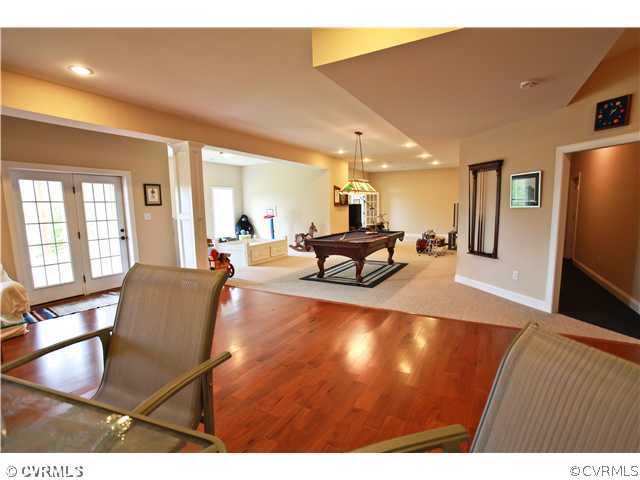 1175 Lickinghole Road Goochland, VA 23063 - Photo 18 of 24 a living room with furniture and a flat screen tv