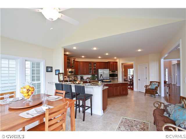 1175 Lickinghole Road Goochland, VA 23063 - Photo 24 of 24 a living room with lots of furniture and kitchen view