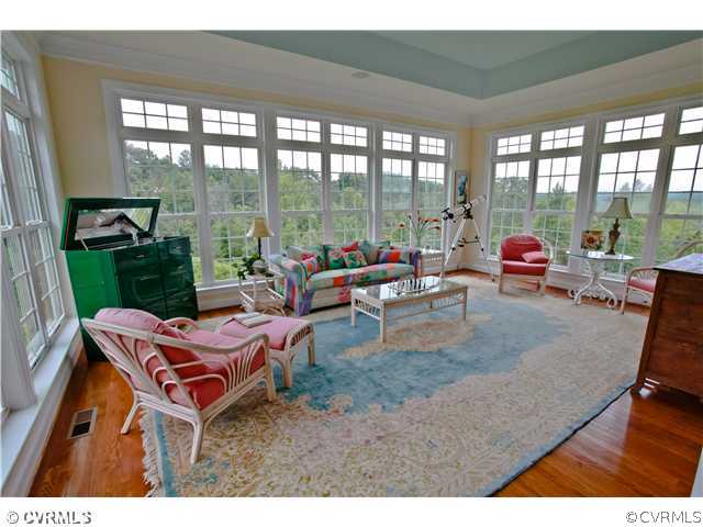 1175 Lickinghole Road Goochland, VA 23063 - Photo 4 of 24 a living room filled with furniture and a floor to ceiling window