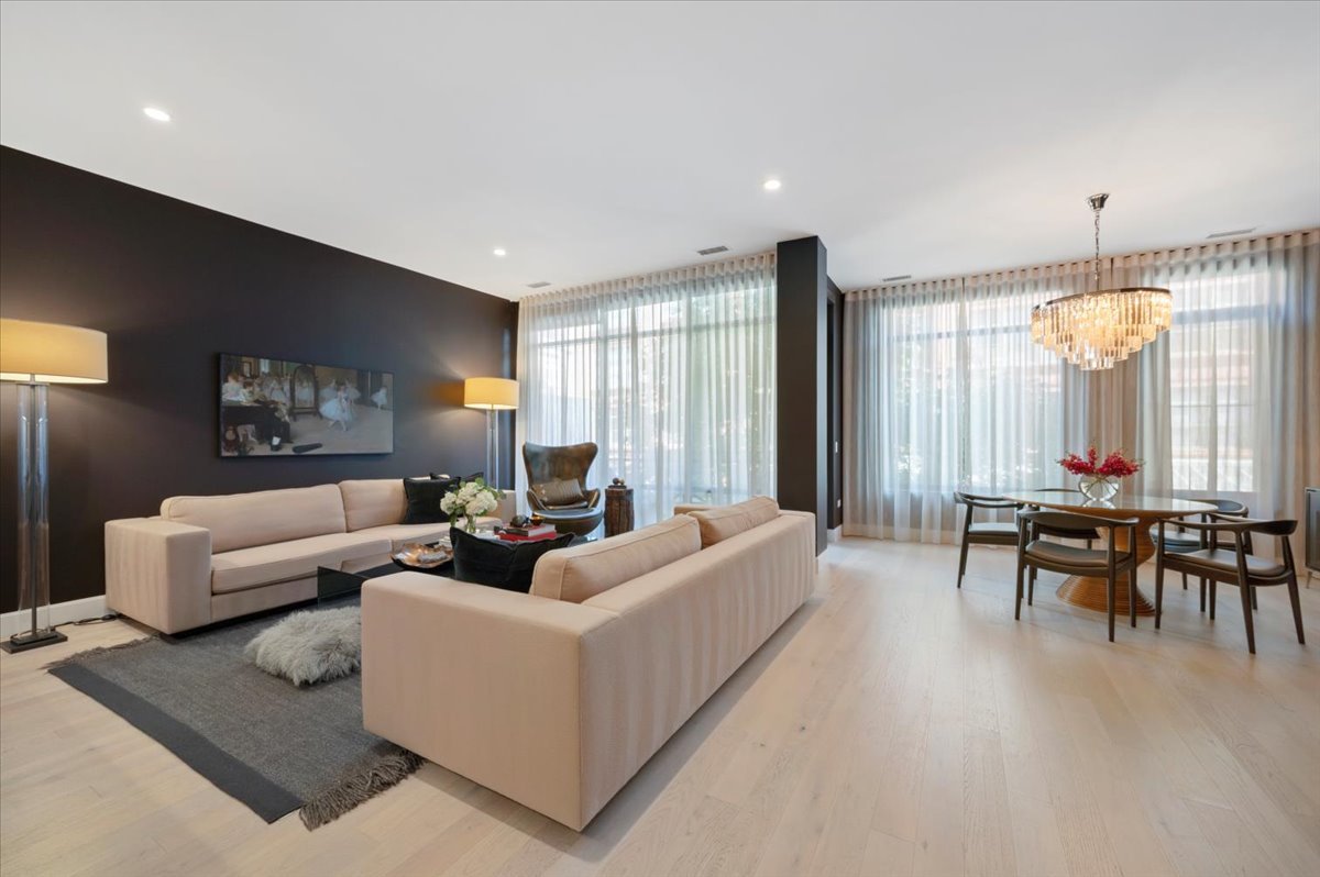 36 North Carpenter Street, Unit 2N Chicago, IL 60607 - Photo 7 of 26 a living room with furniture and large windows
