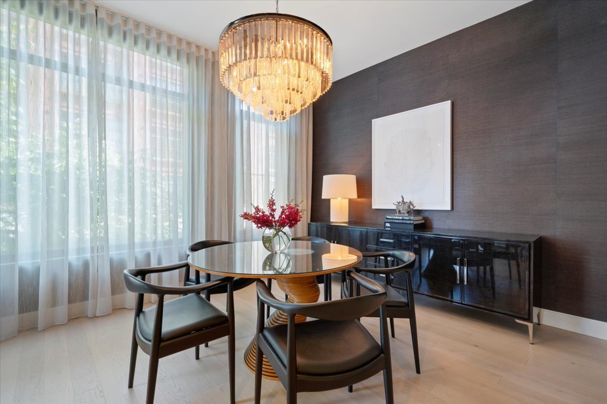 36 North Carpenter Street, Unit 2N Chicago, IL 60607 - Photo 8 of 26 a view of a dining room with furniture window and outside view