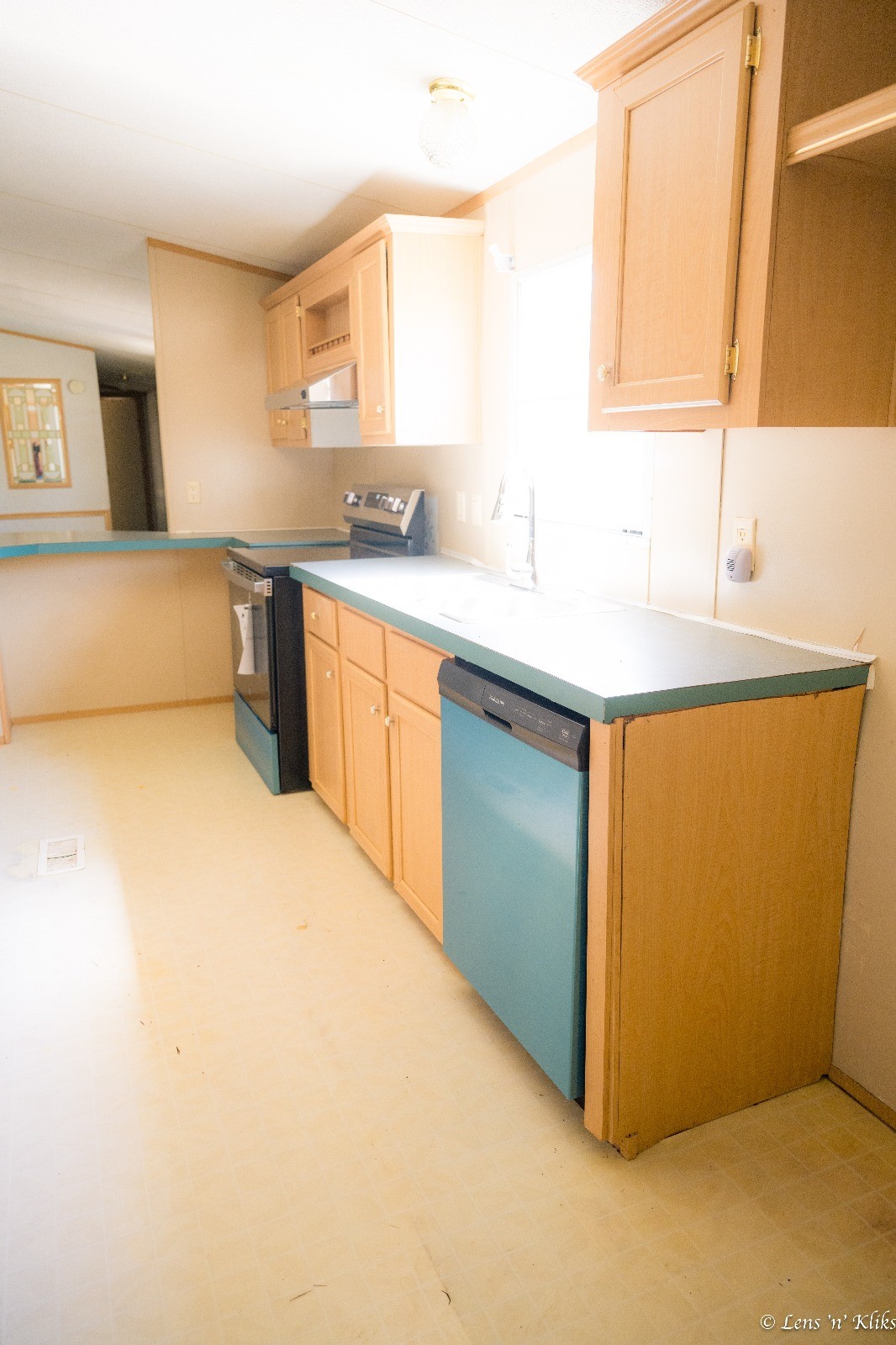 24106 Farm To Market 362 Waller, TX 77484 - Photo 18 of 41 a kitchen with stainless steel appliances a sink and a refrigerator