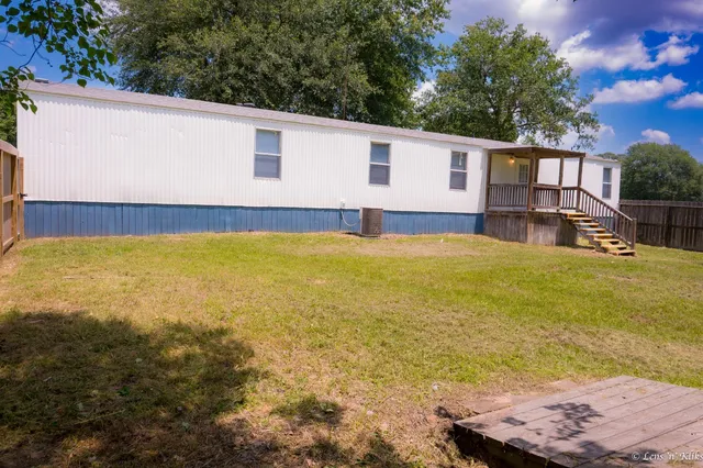 a view of an outdoor space with swimming pool
