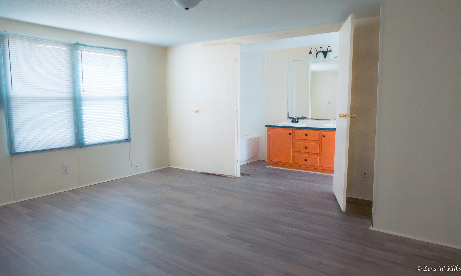 24106 Farm To Market 362 Waller, TX 77484 - Photo 29 of 41 an empty room with wooden floor and windows