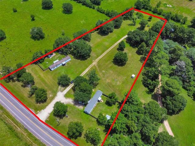 a view of a yard with an umbrella