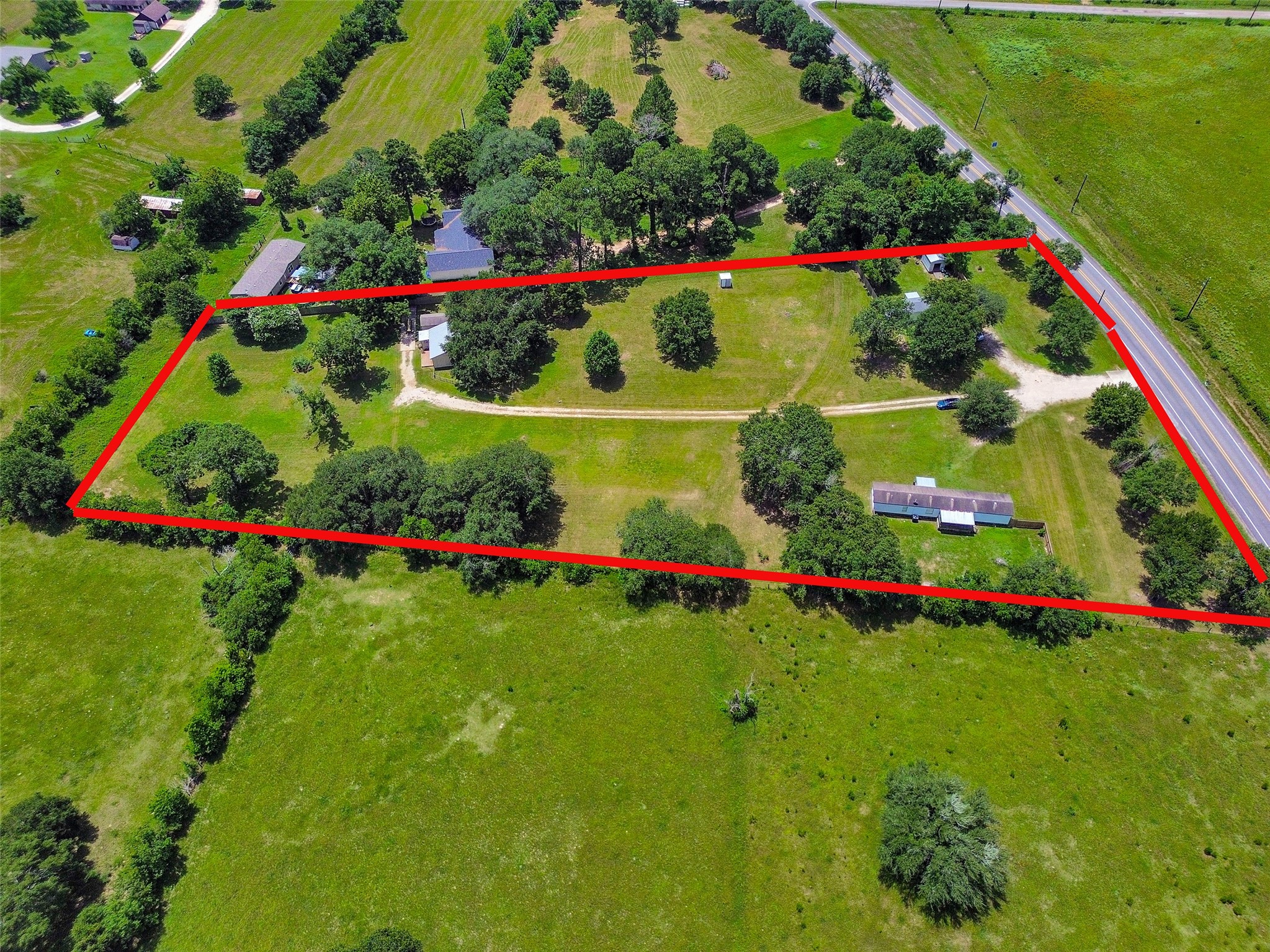 24106 Farm To Market 362 Waller, TX 77484 - Photo 4 of 41 a view of a garden with flowers and plants