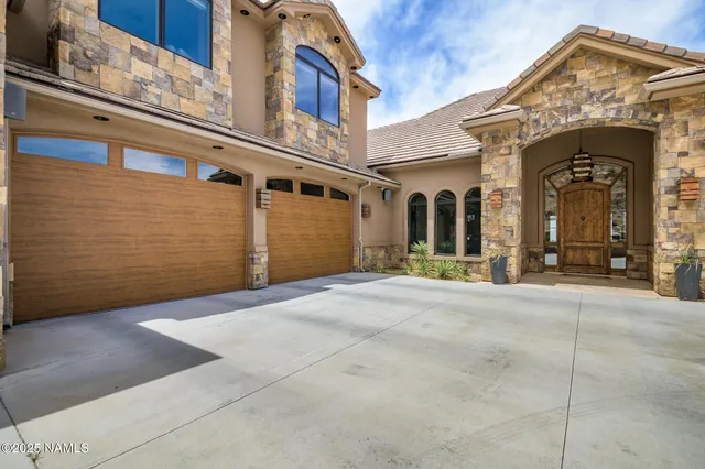 a view of a building with a garage