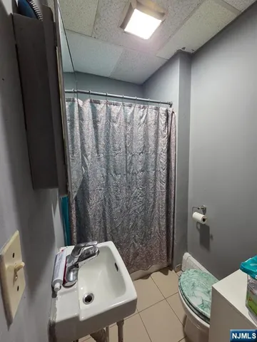 a bathroom with a sink and a toilet
