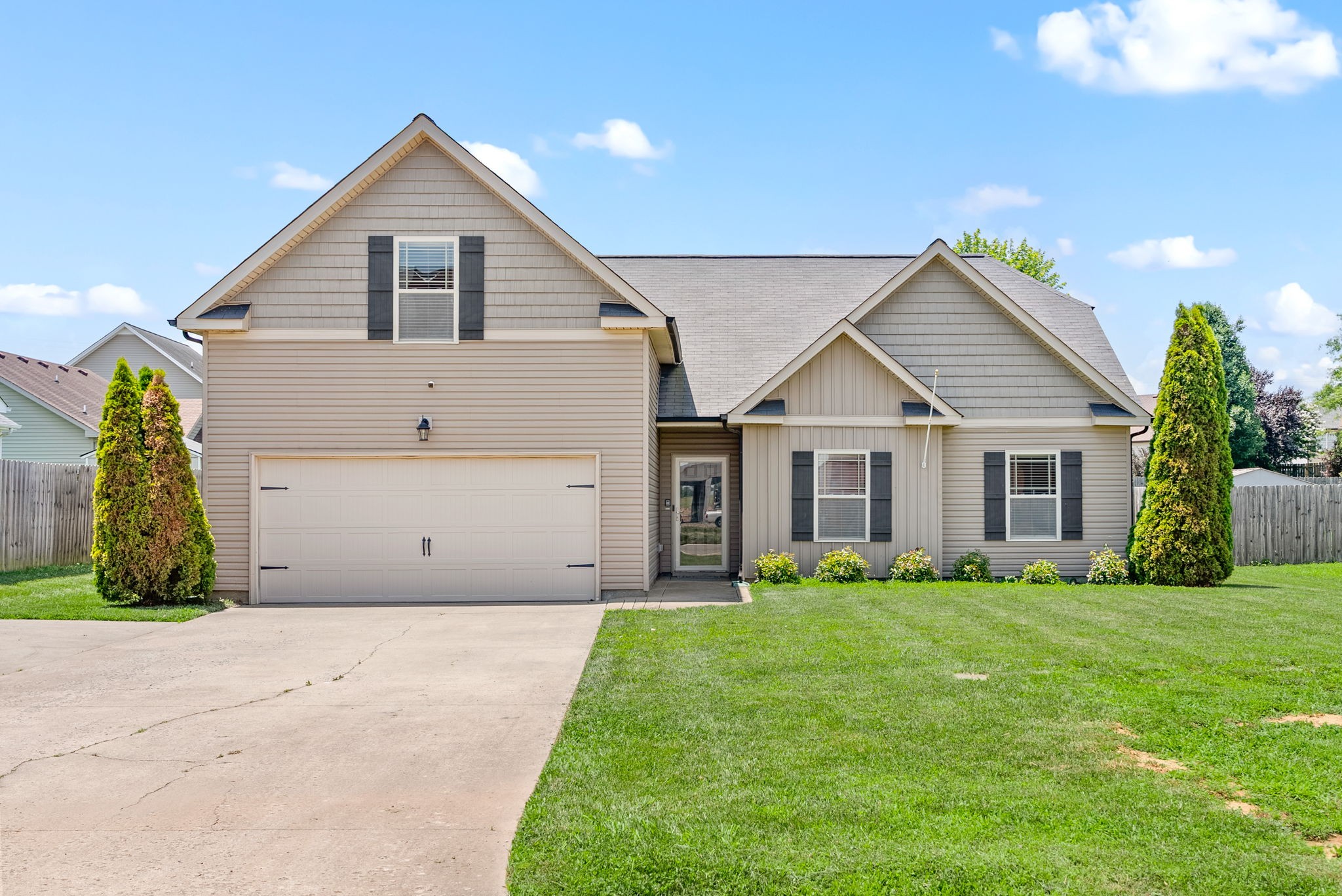 2336 Pea Ridge Road Clarksville, TN 37040 - Photo 1 of 17 a view of a house with a yard and potted plants