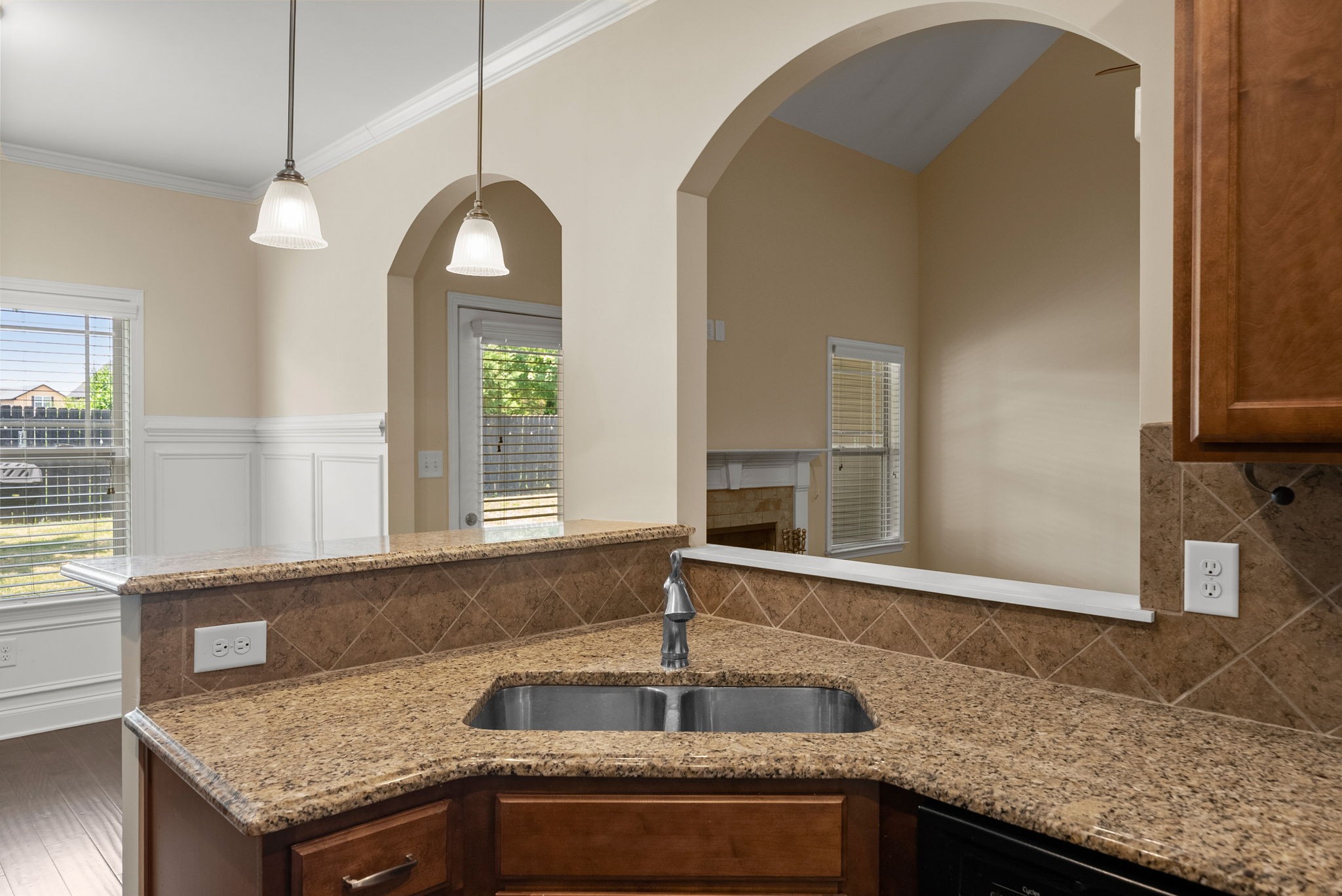 2336 Pea Ridge Road Clarksville, TN 37040 - Photo 5 of 17 a kitchen with granite countertop a sink and a window