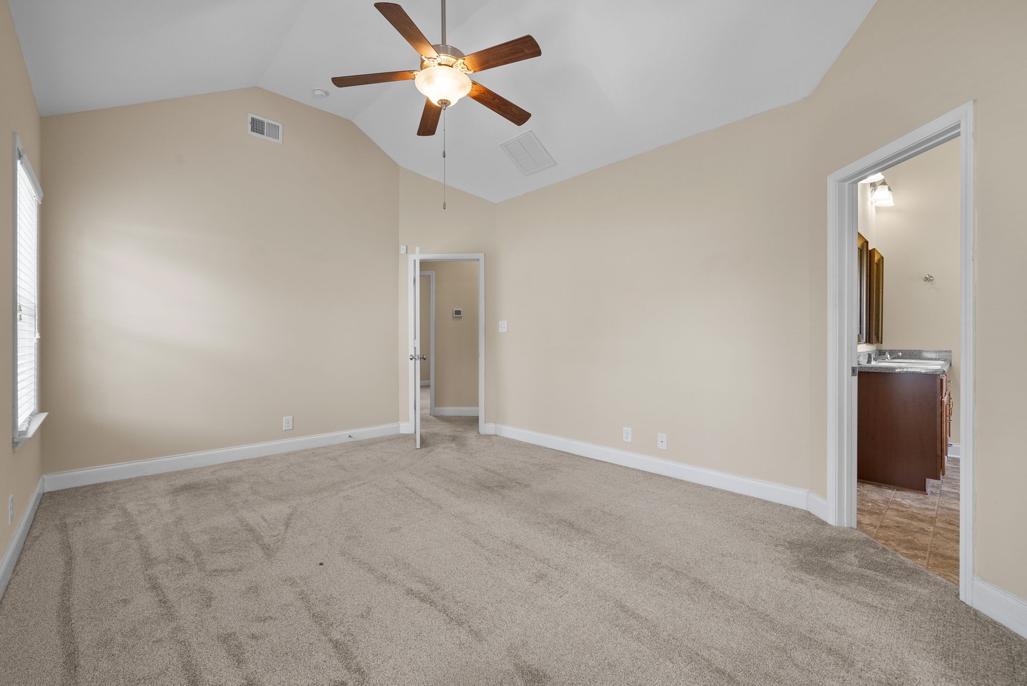 2336 Pea Ridge Road Clarksville, TN 37040 - Photo 9 of 17 an empty room with closet and a chandelier fan