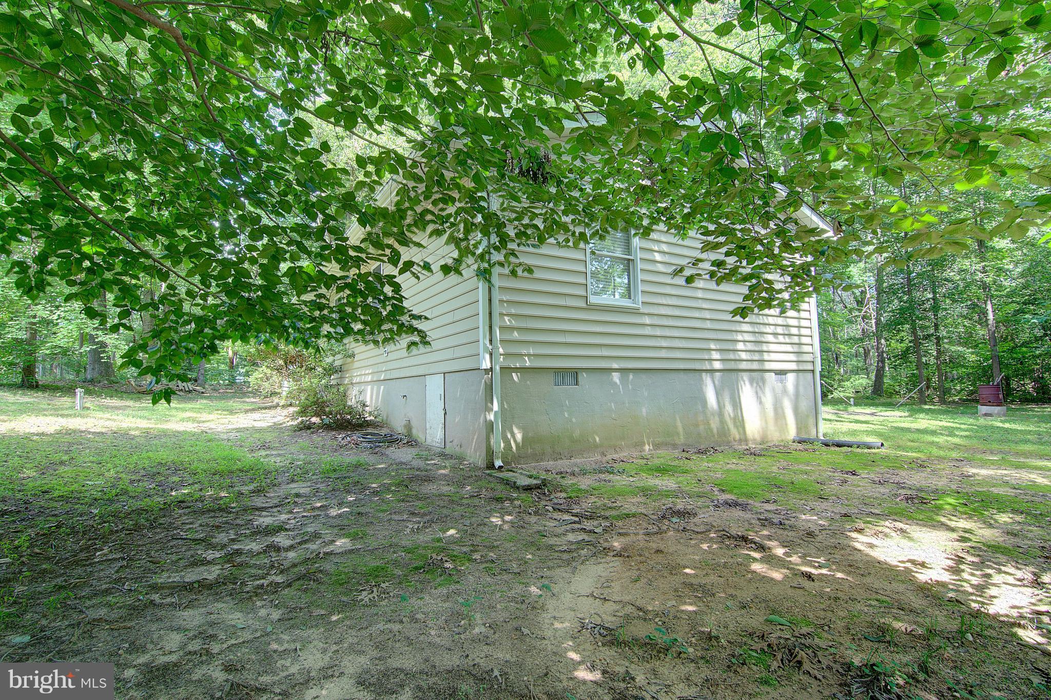 1134 Calvert Beach Road St. Leonard, MD 20685 - Photo 5 of 27 Exterior (Rear)