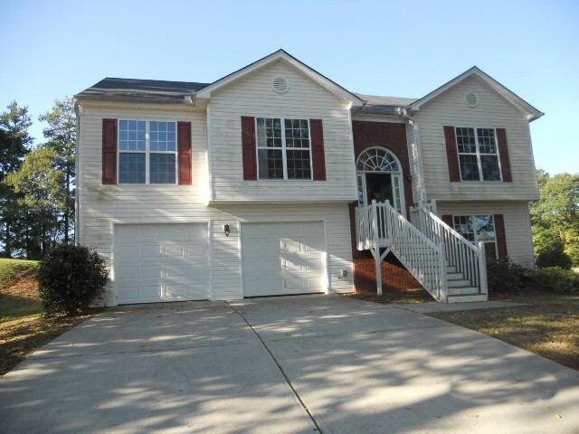 1366 Biedermeier Road Winder, GA 30680 - Photo 1 of 1 a front view of a house with a yard