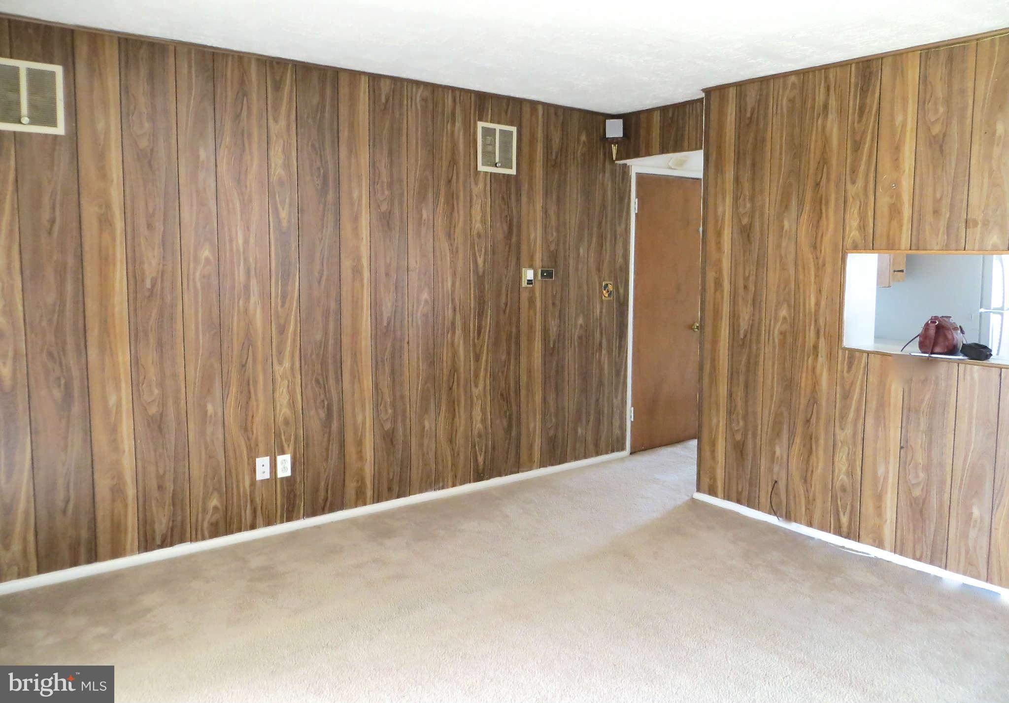 1942 Harewood Road Edgewood, MD 21040 - Photo 6 of 11 a view of a hallway with wooden walls