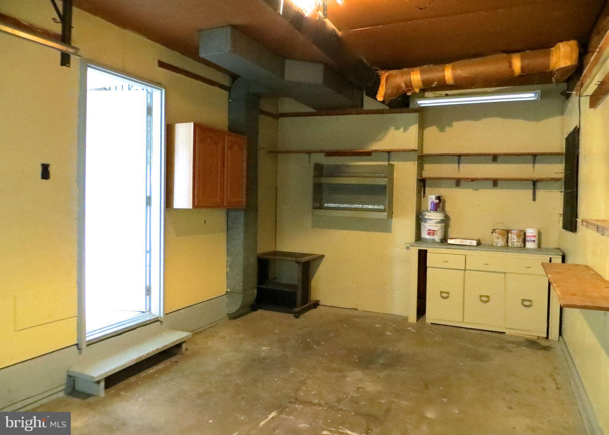 1942 Harewood Road Edgewood, MD 21040 - Photo 10 of 11 a room with storage and utility