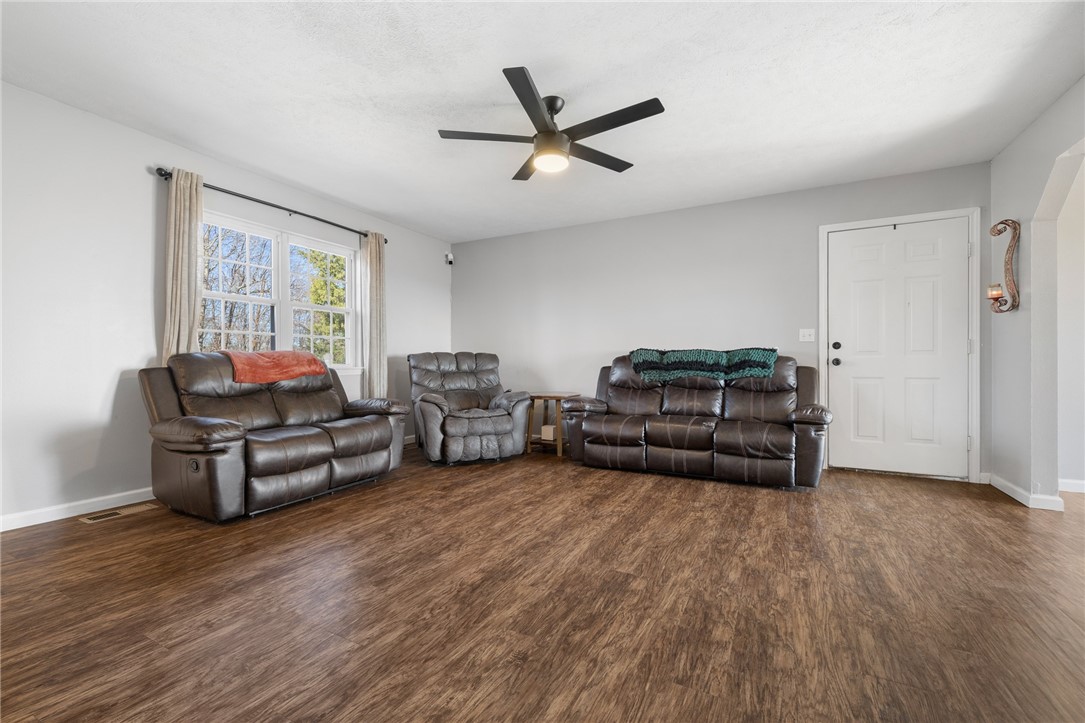 10974 Ricks Drive Harrison, AR 72601 - Photo 15 of 59 Living area with dark wood-style floors and a ceiling fan