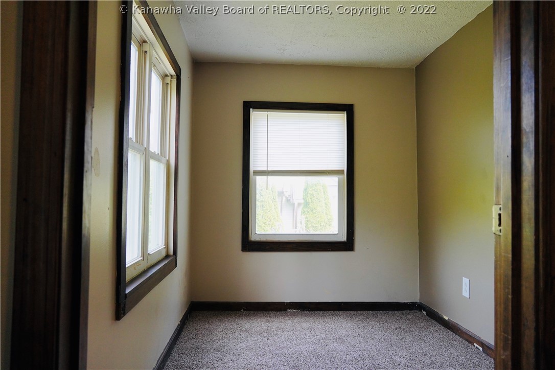 198 Ritz Mountain Road Elkview, WV 25071 - Photo 13 of 23 This room has a lot of natural light. It would be a great space for a playroom, craft room, bedroom, office or anything you'd like!