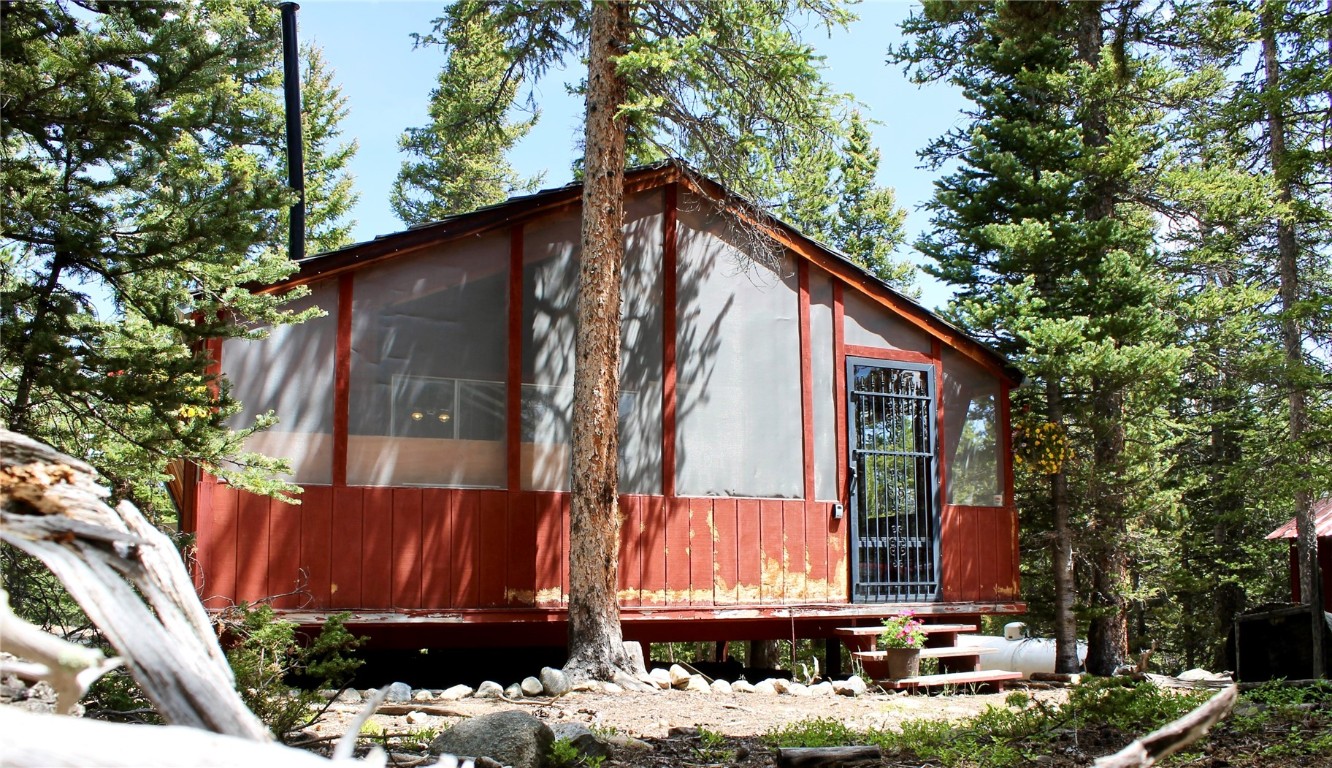 2190 Kootchie Kootchie Road Alma, CO 80420 - Photo 13 of 35 a view of house with a small yard