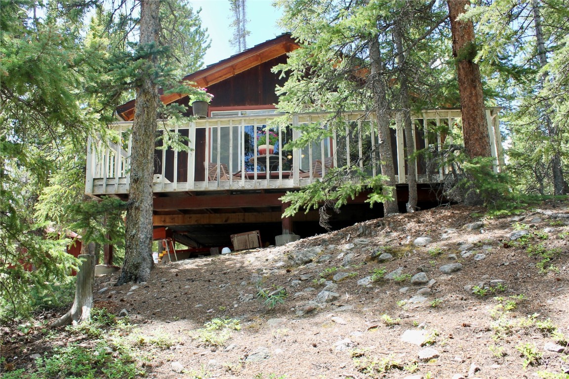 2190 Kootchie Kootchie Road Alma, CO 80420 - Photo 22 of 35 a view of a house with backyard and sitting area