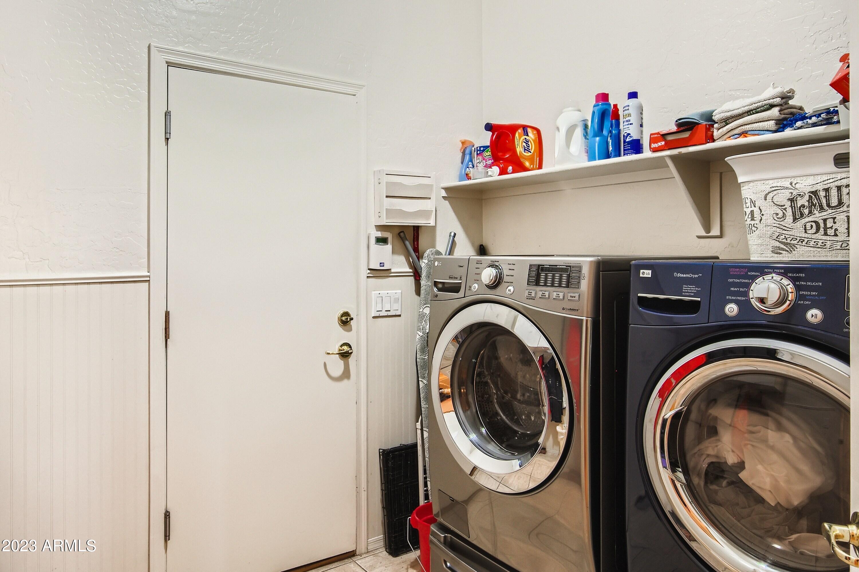 3060 North Ridgecrest, Unit 175 Mesa, AZ 85207 - Photo 23 of 28 a utility room with dryer and washer