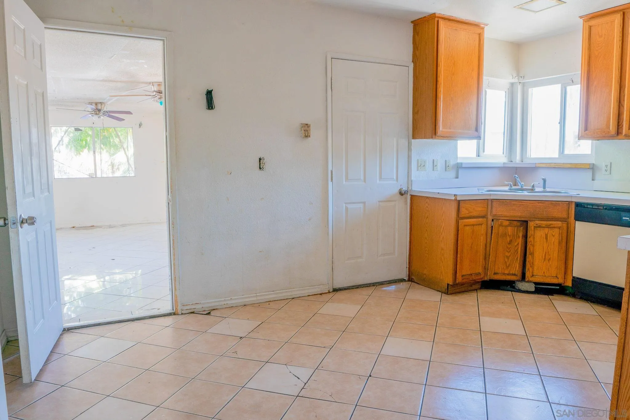 9209 Jamacha Boulevard Spring Valley, CA 91977 - Photo 14 of 26 a view of a kitchen with a window