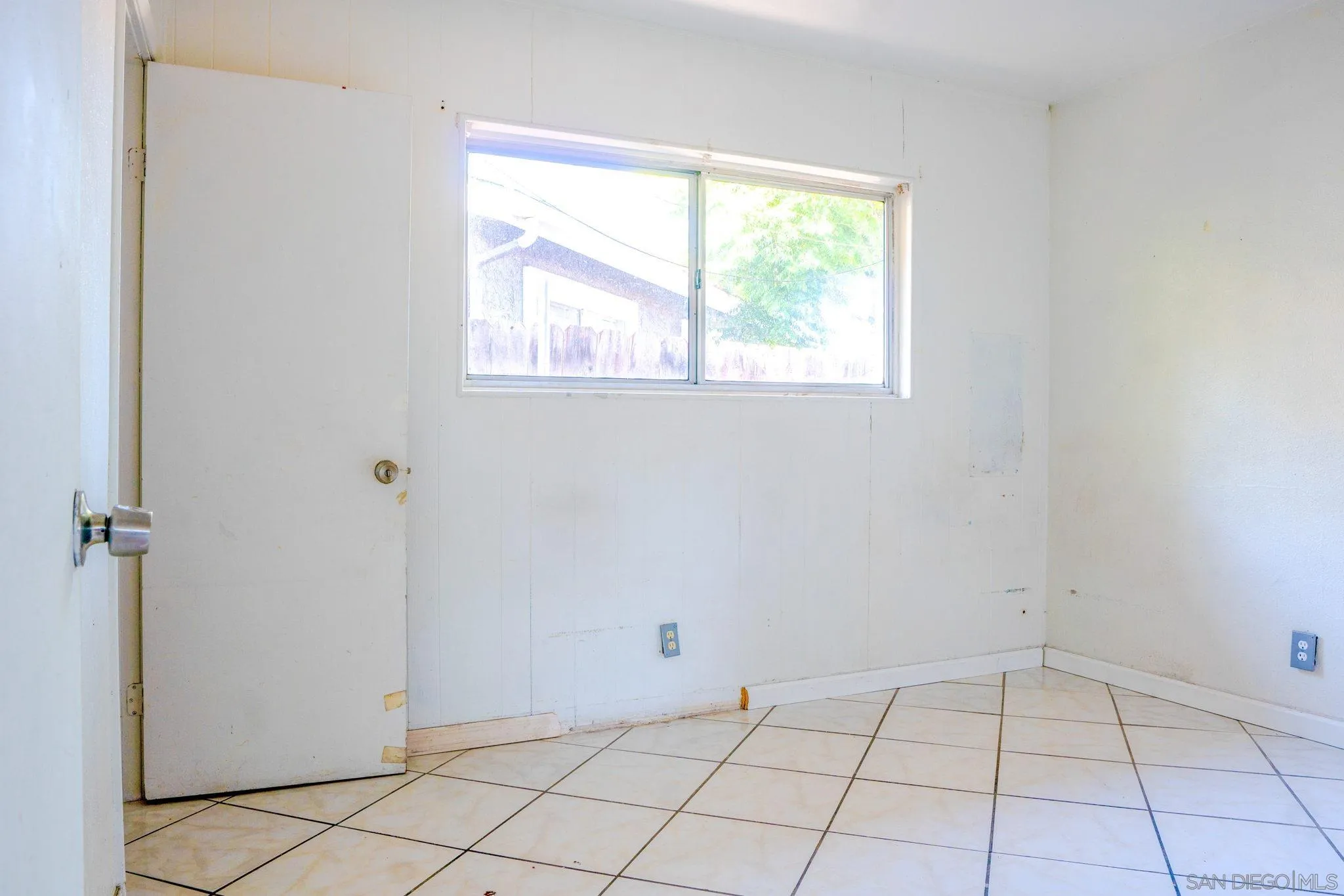 9209 Jamacha Boulevard Spring Valley, CA 91977 - Photo 19 of 26 a view of an empty room and window