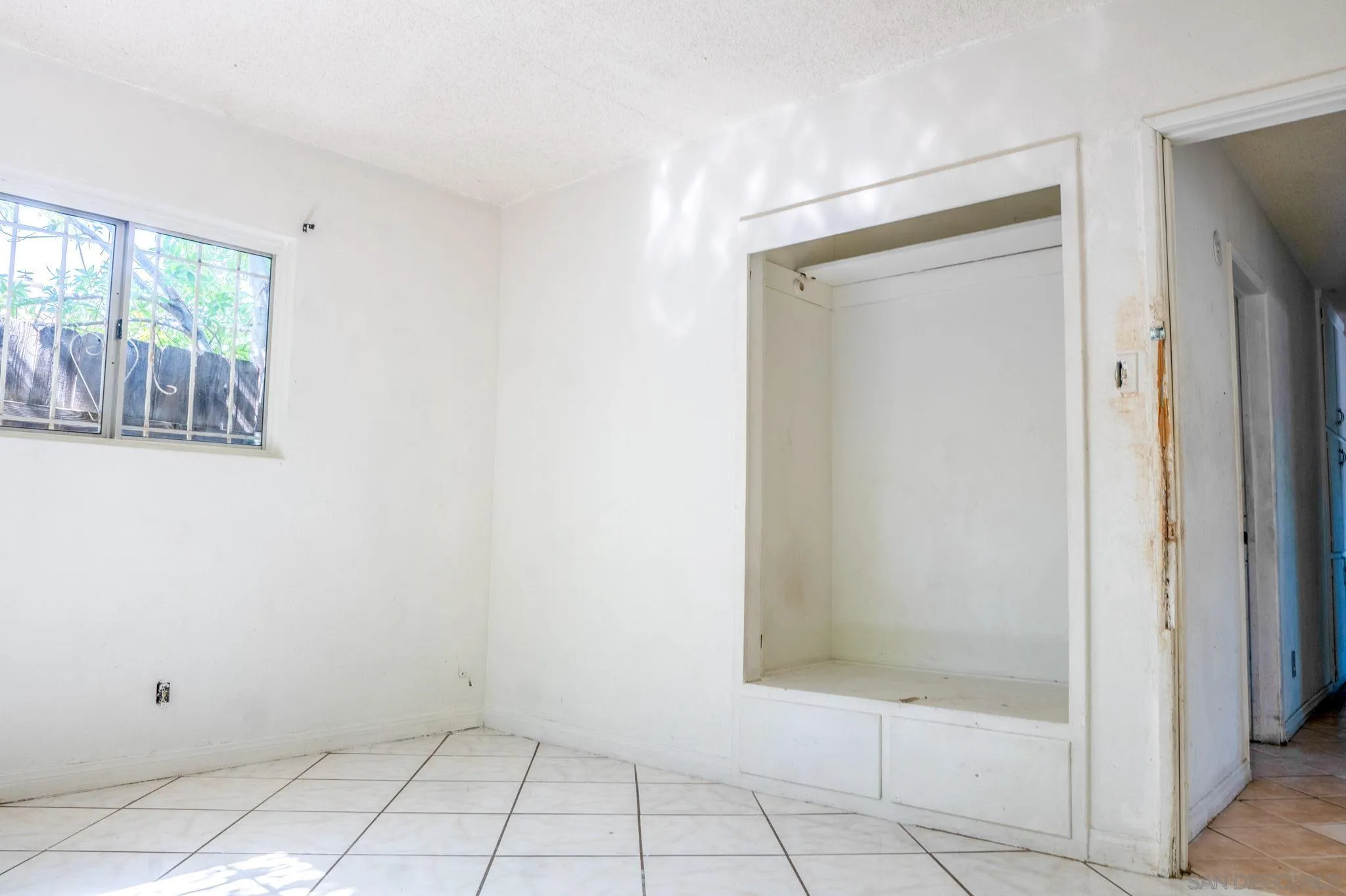 9209 Jamacha Boulevard Spring Valley, CA 91977 - Photo 24 of 26 a view of an empty room with window