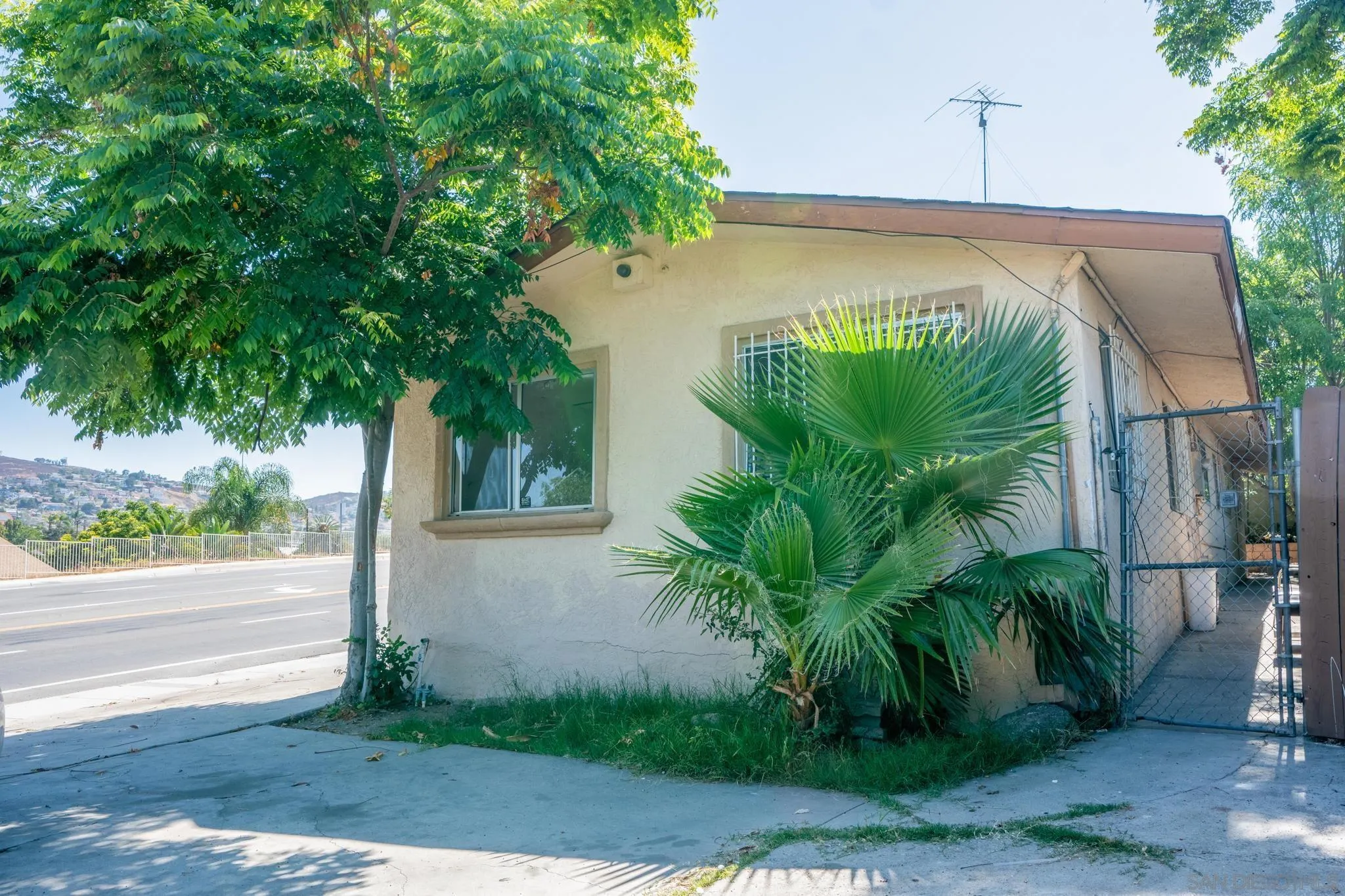 9209 Jamacha Boulevard Spring Valley, CA 91977 - Photo 7 of 26 a view of a backyard with plants and a small yard