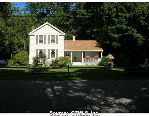 44 Sharon Station Road Sharon, CT 06069 - Photo 1 of 1 a front view of a house with a garden