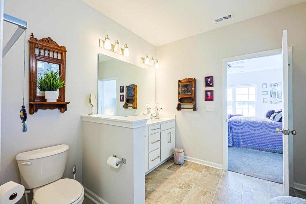 2821 Rivolet Drive Conway, SC 29526 - Photo 16 of 34 Bathroom featuring vanity and connected bathroom