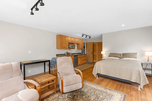 a bedroom with furniture and a couch