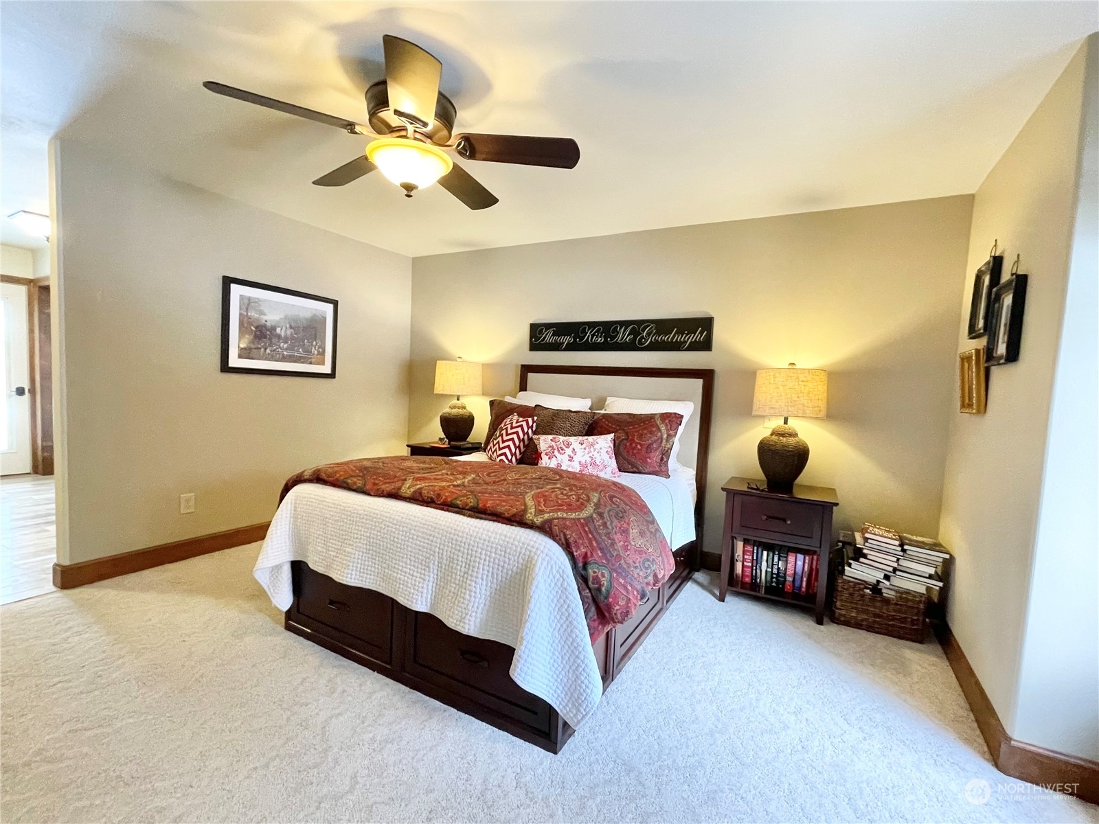 14 Pogue Road Okanogan, WA 98840 - Photo 24 of 40 a spacious bedroom with a bed and a chandelier