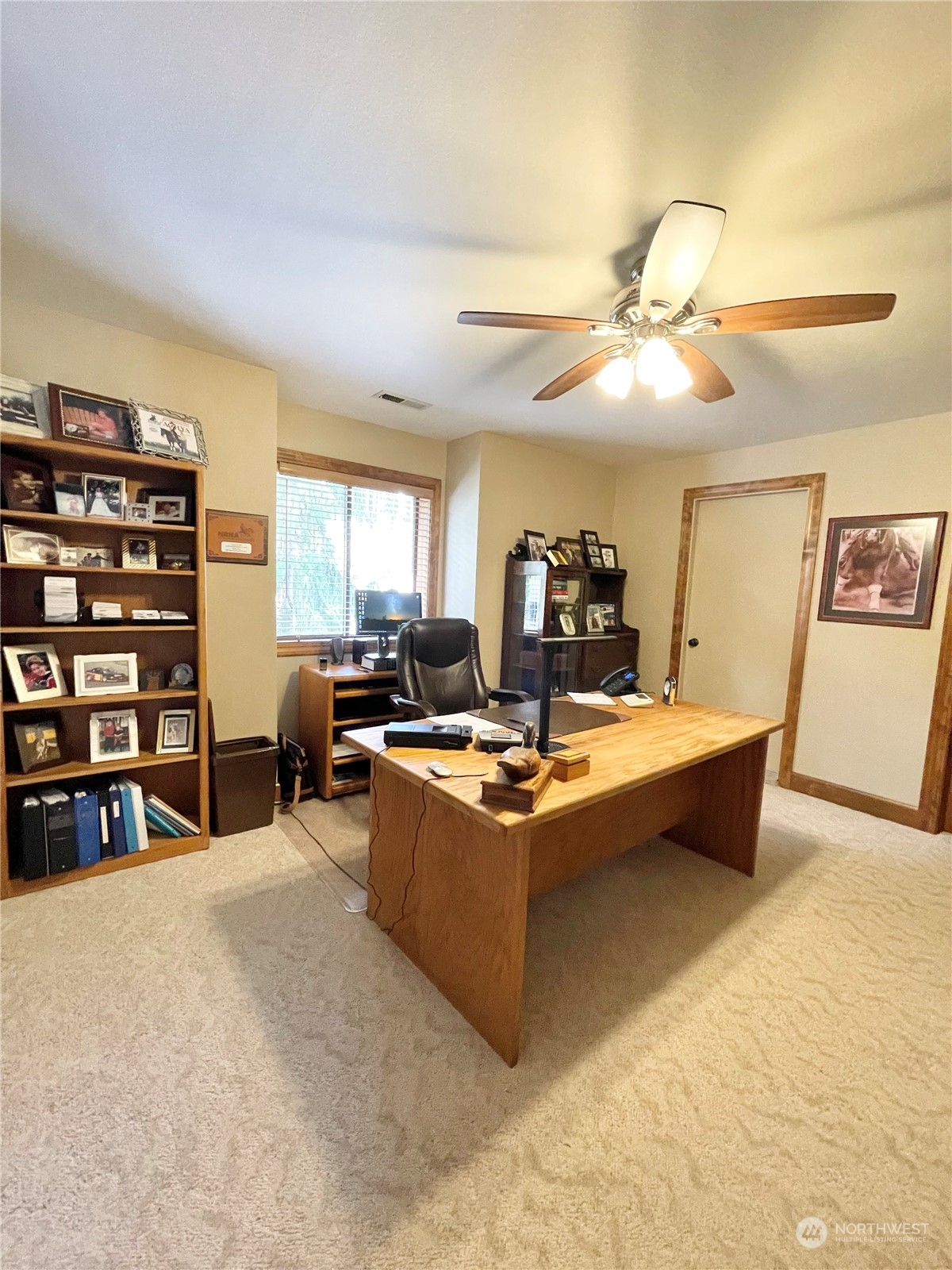 14 Pogue Road Okanogan, WA 98840 - Photo 34 of 40 a living room with furniture a chandelier and a flat screen tv