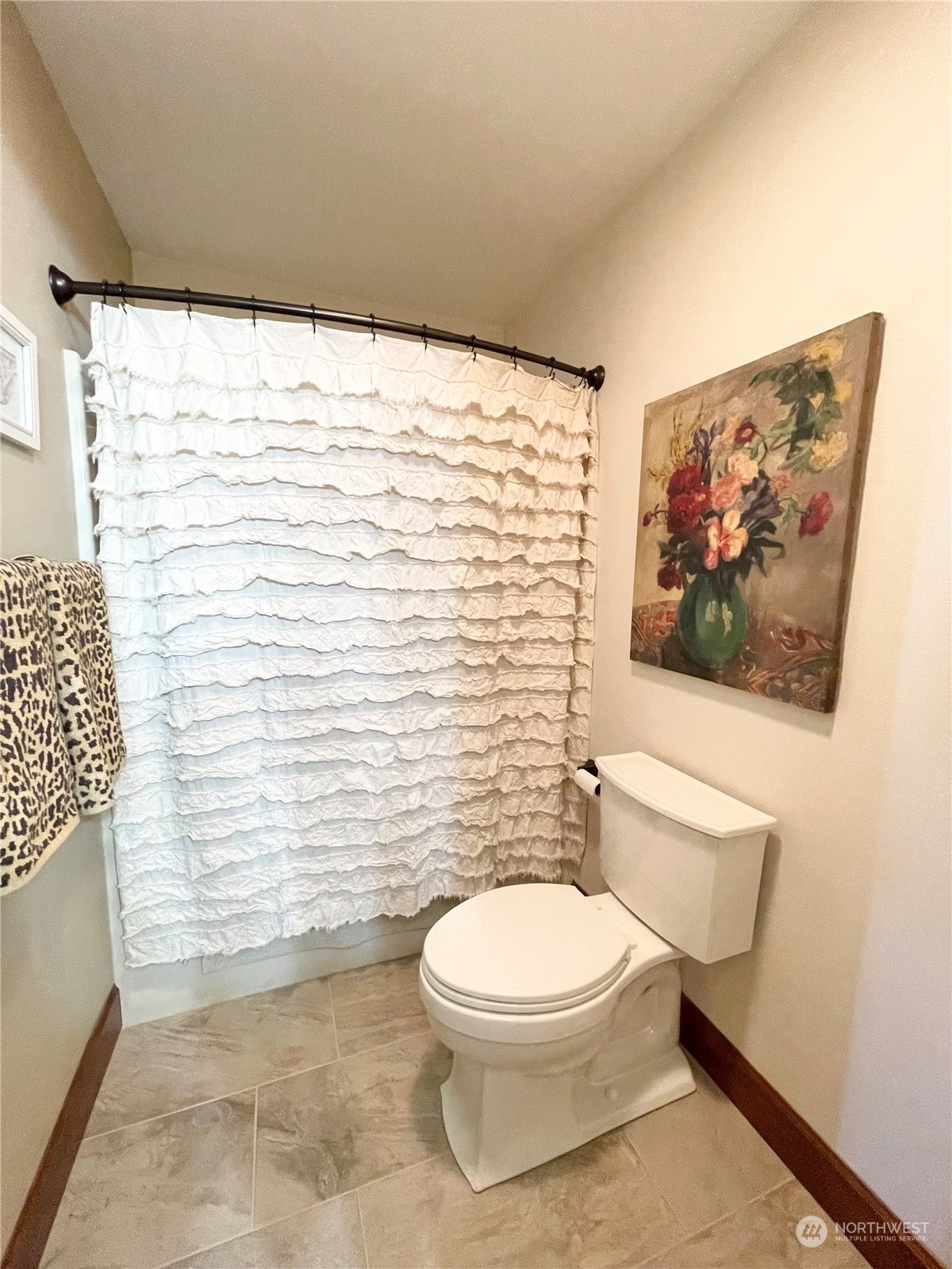 14 Pogue Road Okanogan, WA 98840 - Photo 36 of 40 a white toilet sitting next to a shower curtain